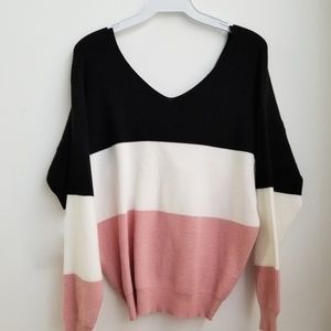 Cute color block sweater top with twist back